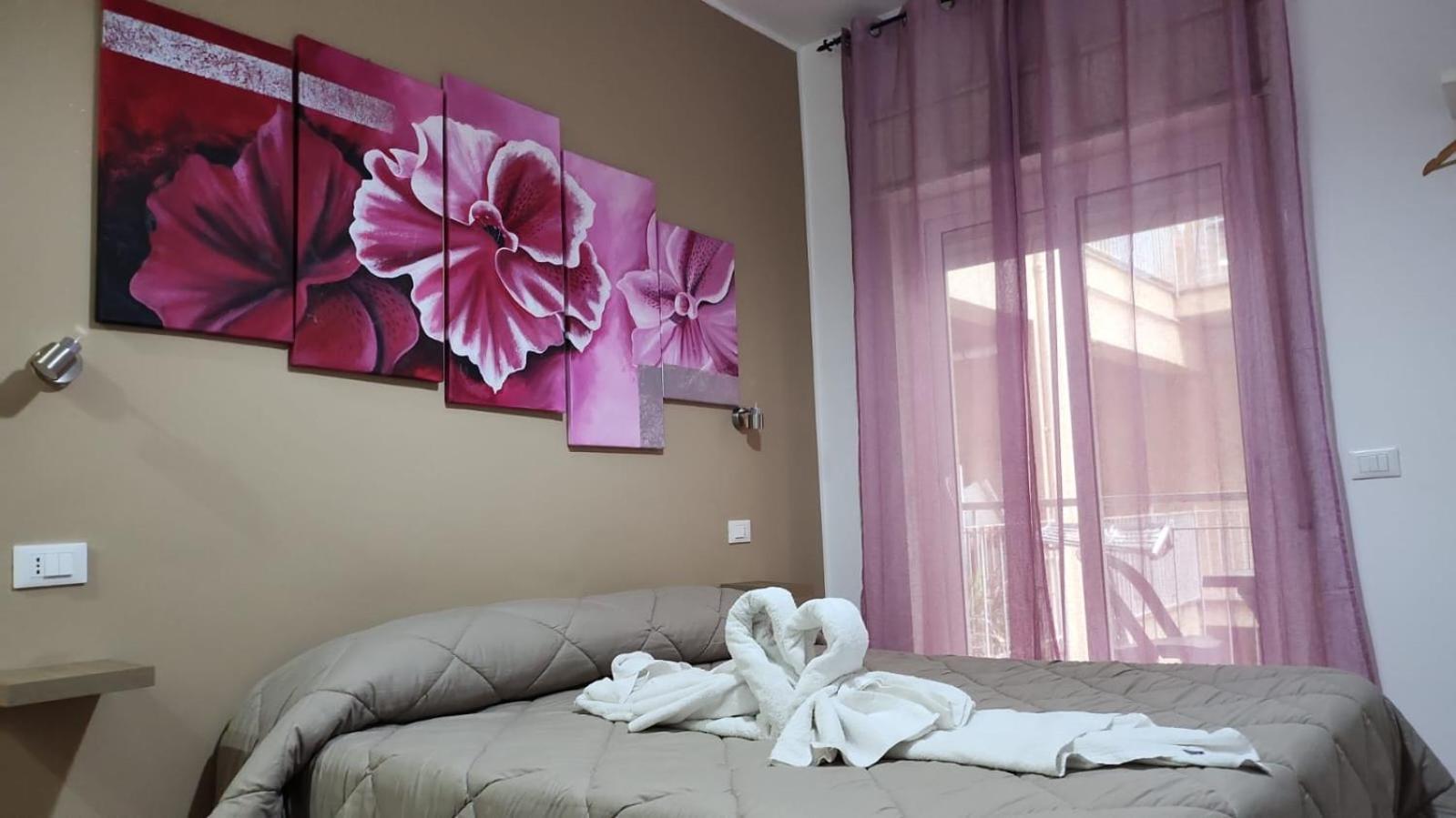 Camera Tripla con Balcone