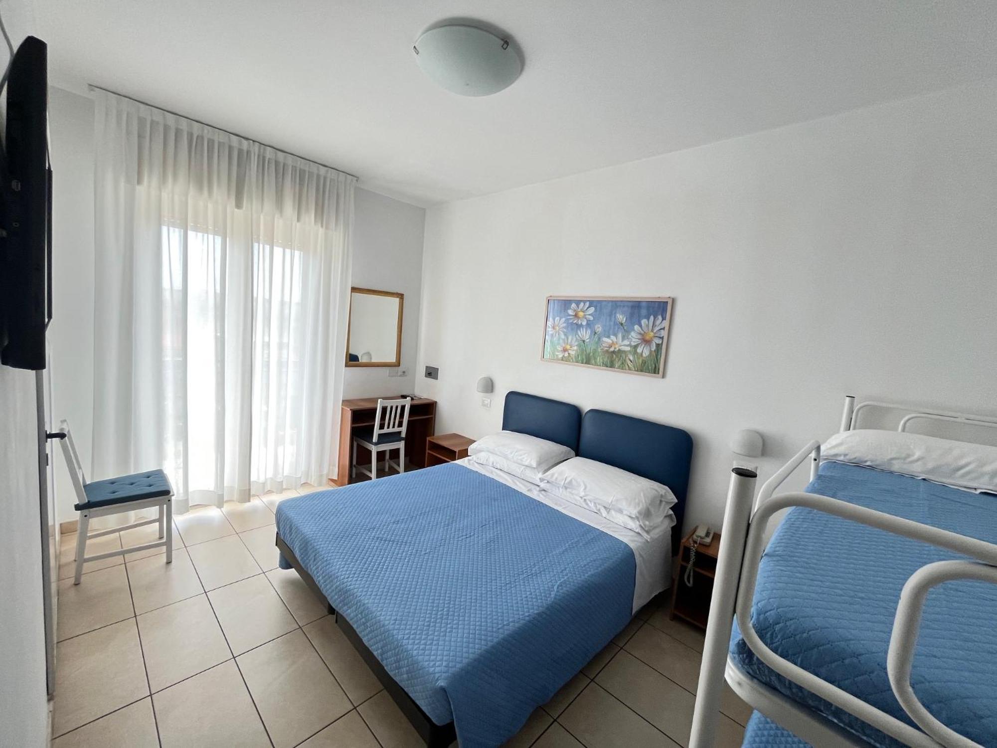 Camera Quadrupla Standard con Balcone