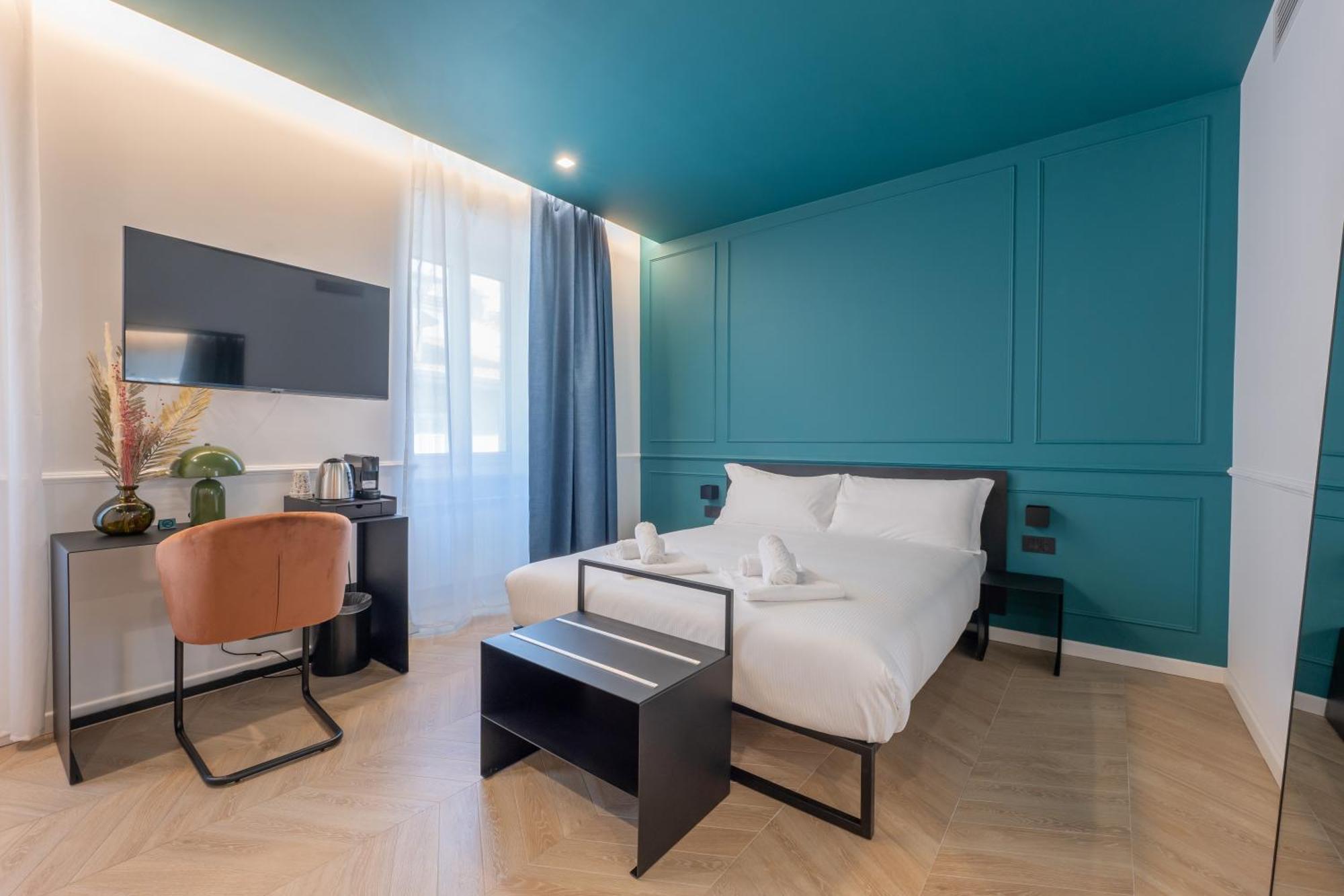 Camera Quadrupla Superior