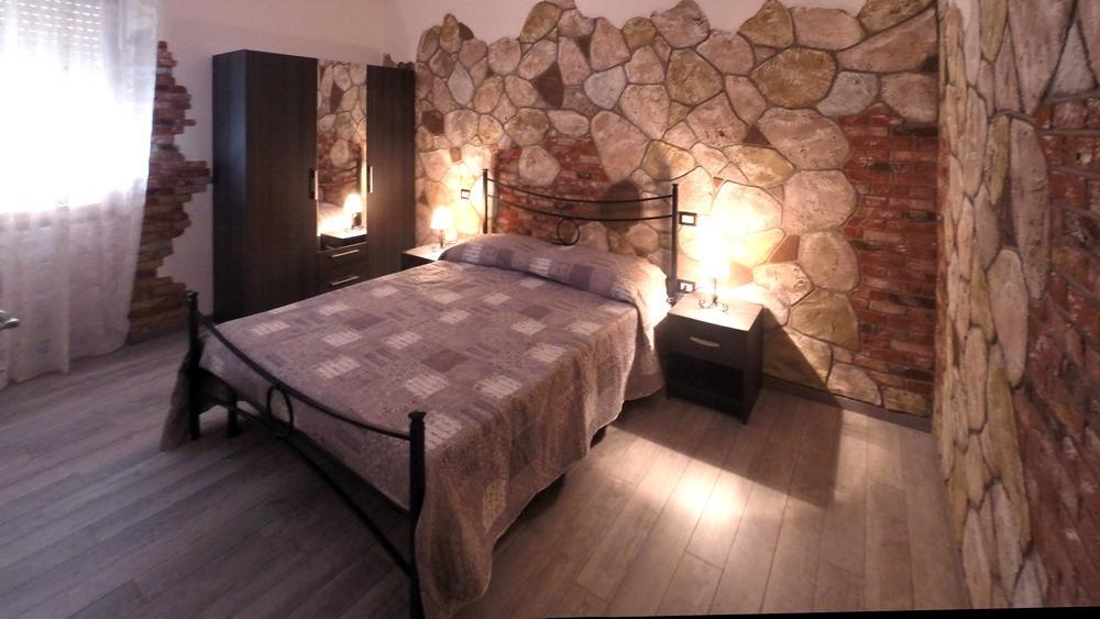 Camera Matrimoniale con Letto Supplementare