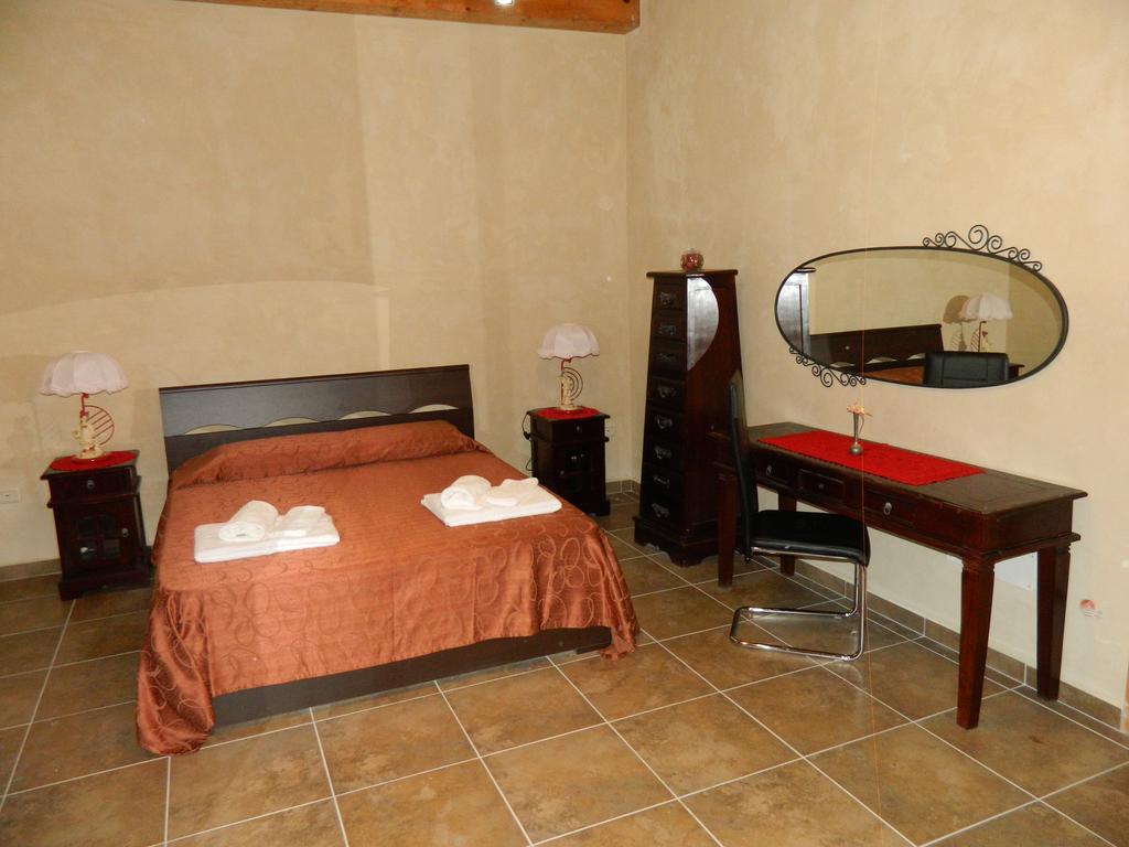 Camera Matrimoniale Deluxe (2 Adulti + 1 Bambino)
